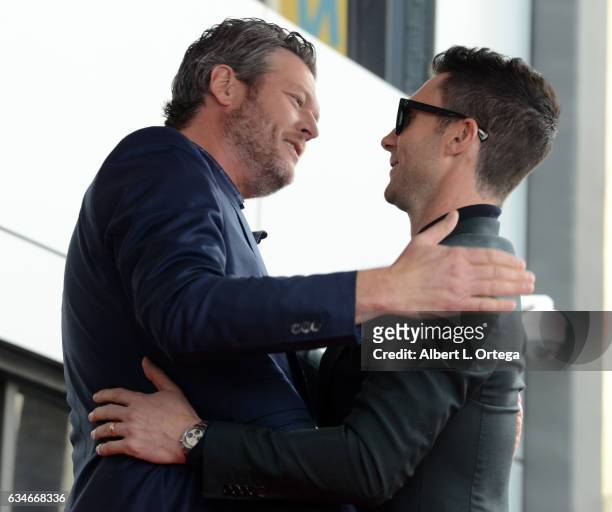 Country artist Blake Shelton and musician Adam Levin at the Adam Levine Star On The Hollywood Walk Of Fame Ceremoney on February 10, 2017 in...