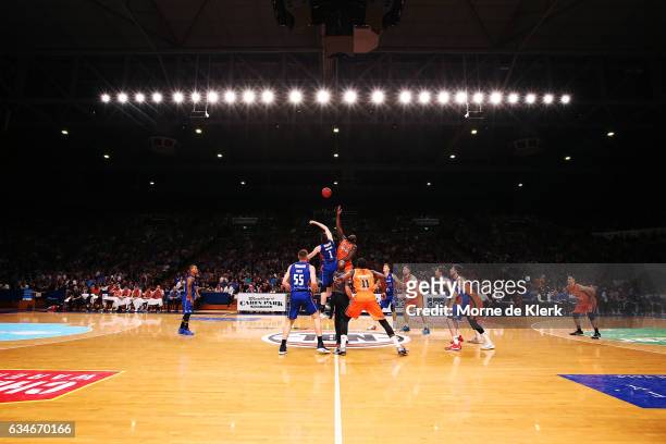 Players compete for the ball during the tip-off during the round 19 NBL match between the Adelaide 36ers and the Cairns Taipans at Titanium Security...