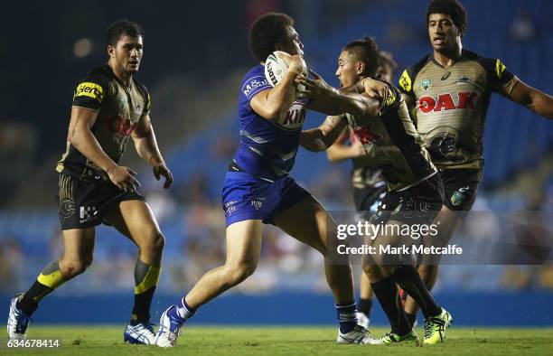 Raymond Faitala-Mariner of the Bulldogs is tackled during the NRL Trial match between the Canterbury Bulldogs and the Penrith Panthers at Belmore...