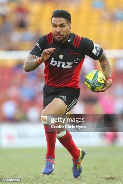 Digby Ioane of the Crusaders makes a break to score a try during the Rugby Global Tens match between Crusaders and Reds at Suncorp Stadium on...