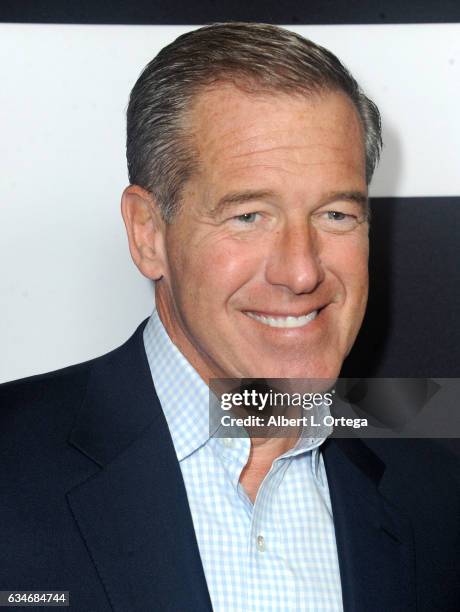 Newscaster Brian Williams arrives for the Screening Of Universal Pictures' "Get Out" held at Regal LA Live Stadium 14 on February 10, 2017 in Los...
