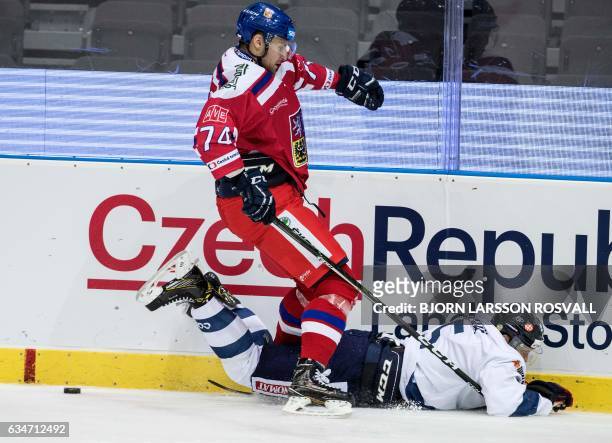Czech's Ondrej Vitasek and Finland's Kristian Nakyva vie during the Finland vs the Czech Republic ice hockey match in the Sweden Hockey Games in the...