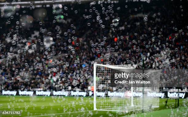 Bubbles are released during the Premier League match between West Ham United and West Bromwich Albion at London Stadium on February 11, 2017 in...