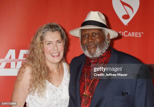 Musician Taj Mahal and Elizabeth Giles attend MusiCares Person of the Year honoring Tom Petty at the Los Angeles Convention Center on February 10,...