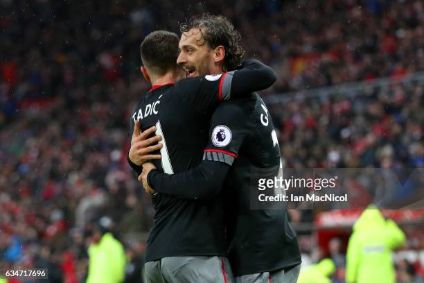 Manolo Gabbiadini of Southampton celebrates scoring the opening goal with his team mate Dusan Tadic during the Premier League match between...