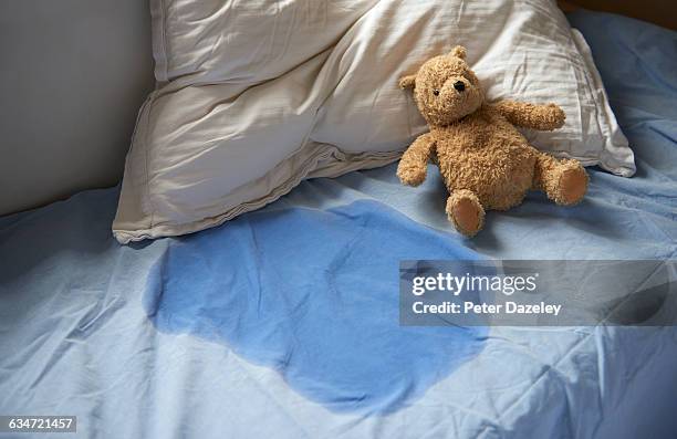 kids bed wetting - urine stock pictures, royalty-free photos & images