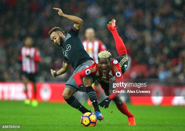 Nathan Redmond of Southampton and Dider N'dong of Sunderland compete for the ball during the Premier League match between Sunderland and Southampton...