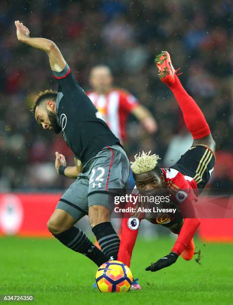 Nathan Redmond of Southampton and Dider N'dong of Sunderland compete for the ball during the Premier League match between Sunderland and Southampton...