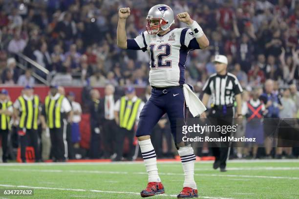 Tom Brady $12 celebrates after Danny Amendola of the New England Patriots catches a six yard touchdown in the fourth quarter against Jalen Collins of...