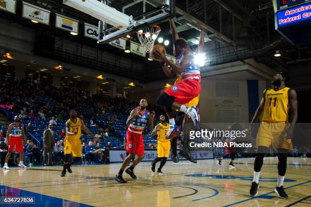 Russ Smith of the Delaware 87ers drives to the basket and passes the ball during the NBA D-League game against the Canton Charge on February 10, 2017...