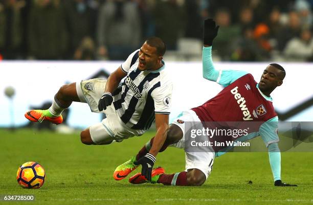 Jose Salomon Rondon of West Bromwich Albion is challenged by Pedro Obiang of West Ham United during the Premier League match between West Ham United...