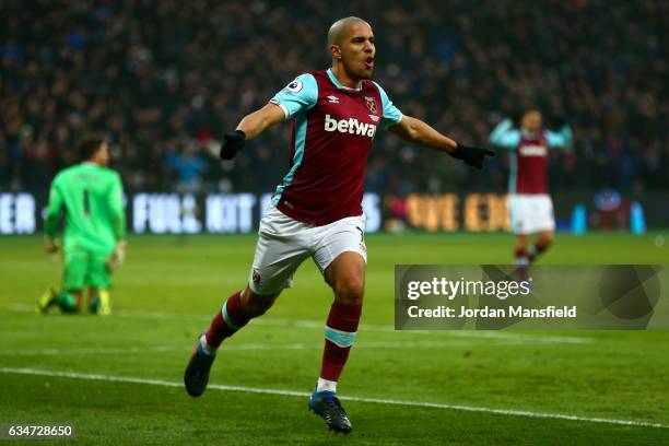 Sofiane Feghouli of West Ham United celebrates his side's first goal to make it 1-1 during the Premier League match between West Ham United and West...