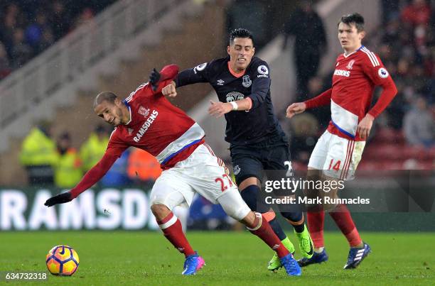 Adlene Guedioura of Middlesbrough and Ramiro Funes Mori of Everton compete for the ball during the Premier League match between Middlesbrough and...