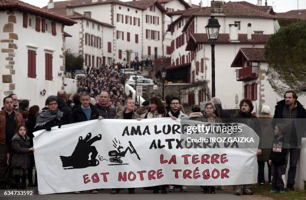 Some 1,000 people demonstrate in the streets of Espelette against gold mines projects by Sudmine group on a dozen town's territories of the Basque...