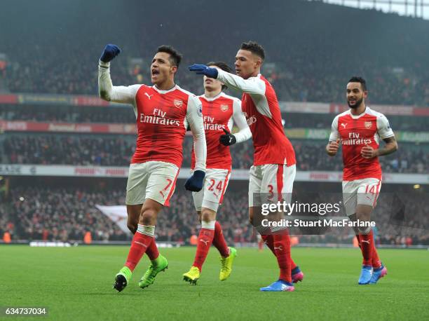 Alexis Sanchez celebrates scoring the 1st Arsenal goal with Kieran Gibbs during the Premier League match between Arsenal and Hull City at Emirates...