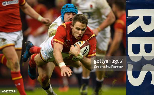Liam Williams of Wales dives over to score during the RBS Six Nations match between Wales and England at Principality Stadium on February 11, 2017 in...