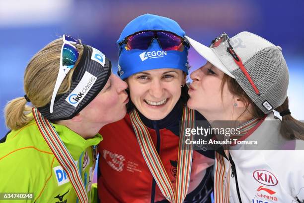 Claudia Pechstein of Germany , Martina Sablikova of Czech Republic and Ivanie Blondin of Canada pose with their medals for the ladies 5000m during...