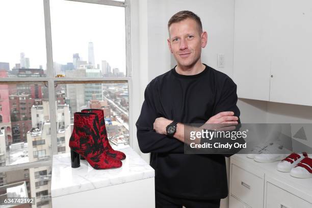 Designer Paul Andrew poses at the Paul Andrew collection during, New York Fashion Week: The Shows at Ramscale Studio on February 11, 2017 in New York...