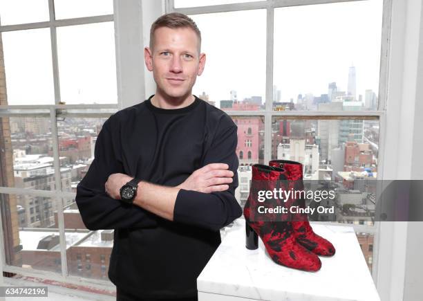 Designer Paul Andrew poses at the Paul Andrew collection during, New York Fashion Week: The Shows at Ramscale Studio on February 11, 2017 in New York...