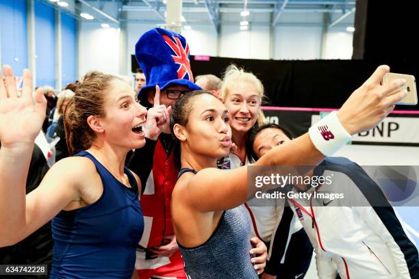 Johanna Konta, Heather Watson and Jocelyn Rae of Great Britain pose for a selfie as they celebrate after the Fed Cup Europe/Africa Group 1,...