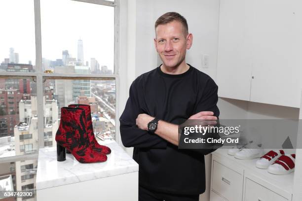 Designer Paul Andrew poses at the Paul Andrew collection during, New York Fashion Week: The Shows at Ramscale Studio on February 11, 2017 in New York...