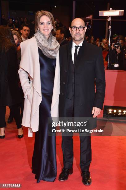 Film director Stanley Tucci and wife Felicity Blunt attend the 'Final Portrait' premiere during the 67th Berlinale International Film Festival Berlin...