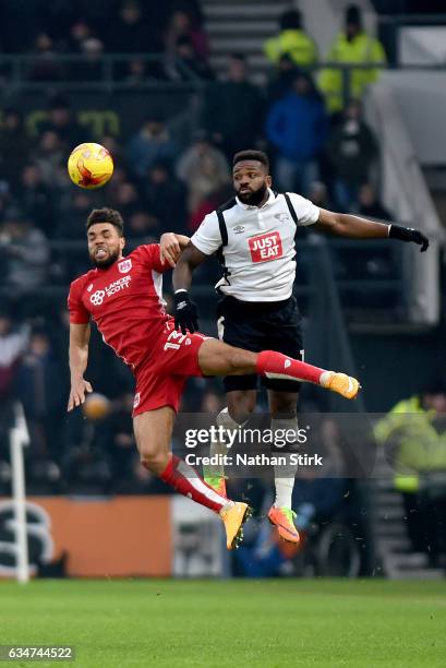 Scott Golbourne of Bristol City and Darren Bent of Derby County in action during the Sky Bet Championship match between Derby County and Bristol City...