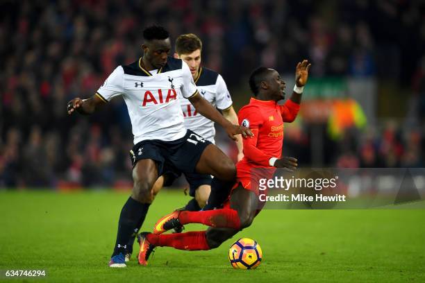 Sadio Mane of Liverpool and Victor Wanyama of Tottenham Hotspur compete for the ball during the Premier League match between Liverpool and Tottenham...