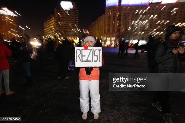 People are seen demonstrating in front of government headquarters on 10 February 2017. Romanians have taken to mass protests across the country for...