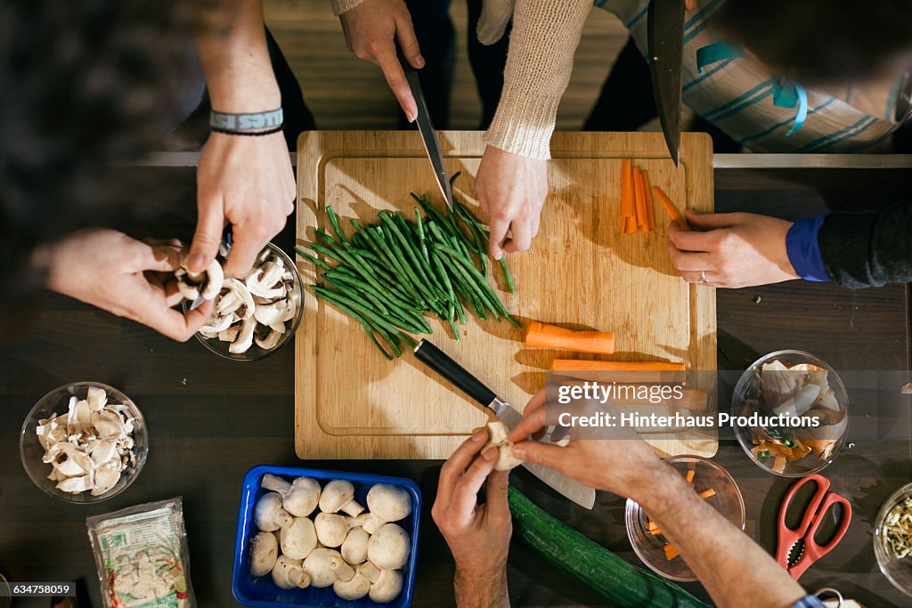 Vegetables being cut in cooking class