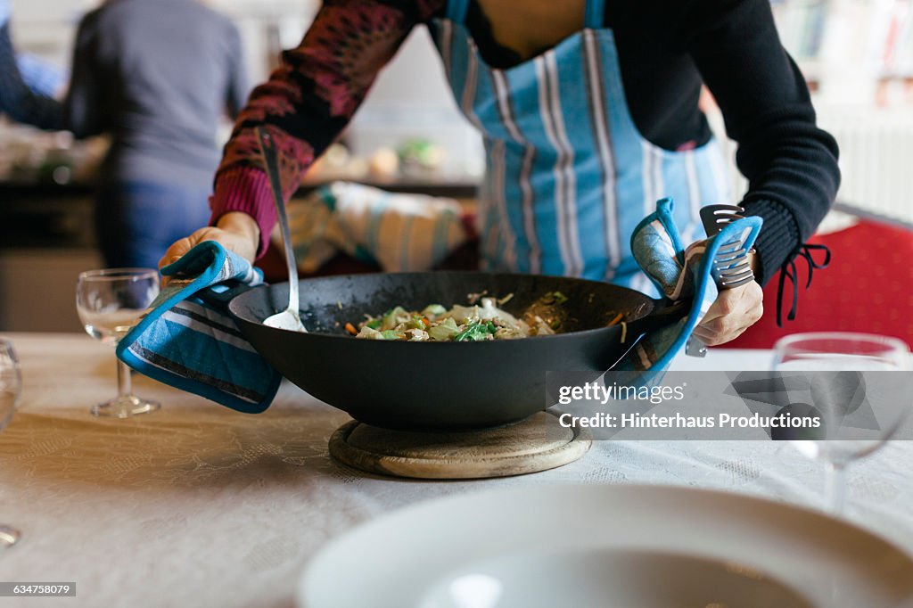 Cooking Wok being placed on a table