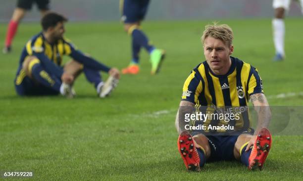 Players of Fenerbahce gesture as the score stands even after the Turkish Spor Toto Super Lig soccer match between Bursaspor and Fenerbahce at Timsah...