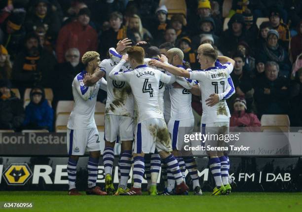 Newcastle players celebrate after Aleksandar Mitrovic of Newcastle United scored the opening goal during the Sky Bet Championship match between...