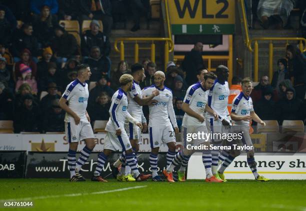 Newcastle players celebrate after Aleksandar Mitrovic of Newcastle United scored the opening goal during the Sky Bet Championship match between...