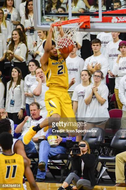 Missouri Tigers forward Jordan Barnett finishes a fast break off with a huge second half slam dunk during the SEC Men's basketball game between the...