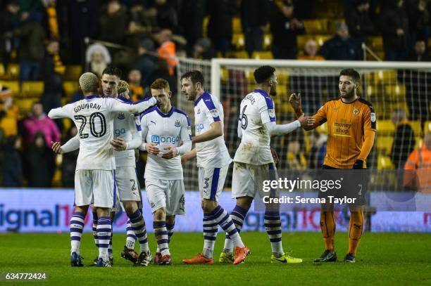 Newcastle players celebrates to fans after Newcastle win the Sky Bet Championship match between Wolverhampton Wanderers and Newcastle United at...