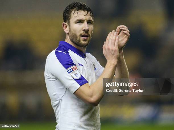 Paul Dummett of Newcastle United claps the fans after Newcastle win the Sky Bet Championship match between Wolverhampton Wanderers and Newcastle...