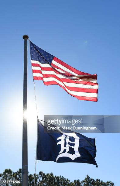 Detailed view of an American flag and a Detroit Tigers flag flying in the TigerTown Complex, the Spring Training home of the Detroit Tigers, on...