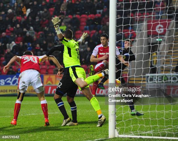 Rotherham United's Stephen Kelly, under pressure from Blackburn Rovers' Derrick Williams scores an own goal to give Blackburn Rovers an equalising...