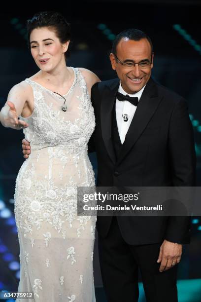 Diana Del Bufalo and Carlo Conti attend the closing night of 67th Sanremo Festival 2017 at Teatro Ariston on February 11, 2017 in Sanremo, Italy.