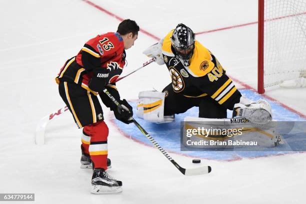 Johnny Gaudreau of the Calgary Flames backands a shot that's saved by Tuukka Rask of the Boston Bruins during the Discover Shootout as part of the...