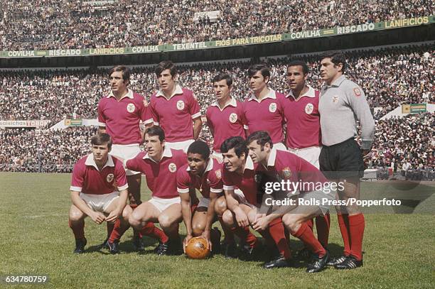 The Benfica football team line up before a game at Estadio da Luz football stadium in Lisbon, Portugal on 29th April 1969. Back row from left to...