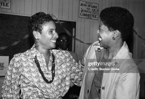 Smiling Jean McGuire congratulates Juanita Wade on her School Committee victory at the Roxbury YMCA in Boston, Nov. 5, 1985.