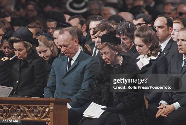 Members of the Eisenhower family including Barbara Eisenhower , John Eisenhower in centre and Mamie Eisenhower on right, attend the funeral service...