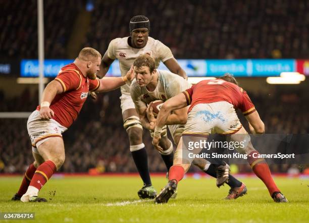 England's Joe Launchbury under pressure from Wales' Alun Wyn Jones during the RBS Six Nations Championship match between Wales and England at...