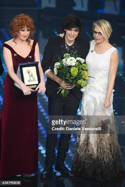 Fiorella Mannoia, Ermal Meta winner of the Mia Martini Award and Maria De Filippi attend the closing night of 67th Sanremo Festival 2017 at Teatro...