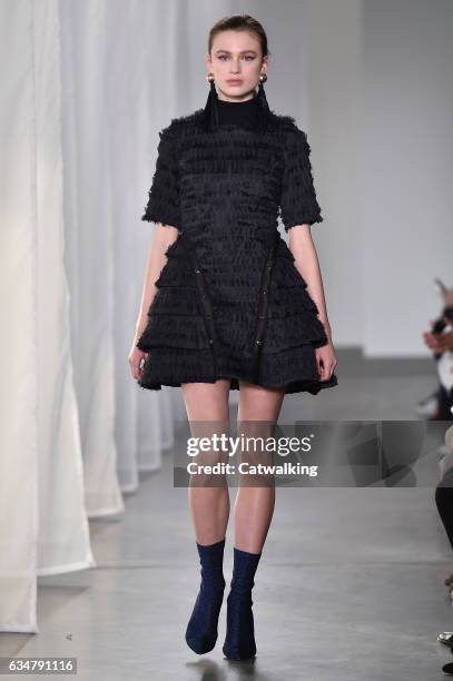 Model walks the runway at the CG by Chris Gelinas Autumn Winter 2017 fashion show during New York Fashion Week on February 11, 2017 in New York,...