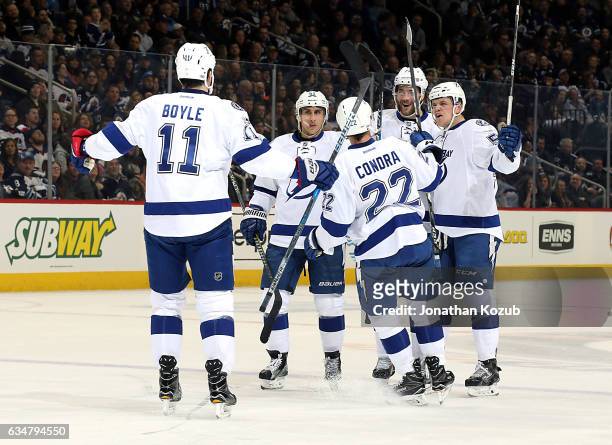 Brian Boyle, Valtteri Filppula, Erik Condra, Victor Hedman and Jake Dotchin of the Tampa Bay Lightning celebrate a first period goal against the...