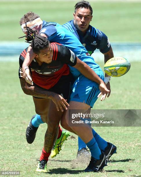 Sean Wainui of the Crusaders takes on the defence during the Rugby Global Tens match between the Crusaders and Blues at Suncorp Stadium on February...
