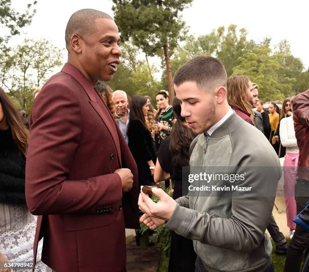 Jay Z and Nick Jonas attend 2017 Roc Nation Pre-GRAMMY brunch at Owlwood Estate on February 11, 2017 in Los Angeles, California.